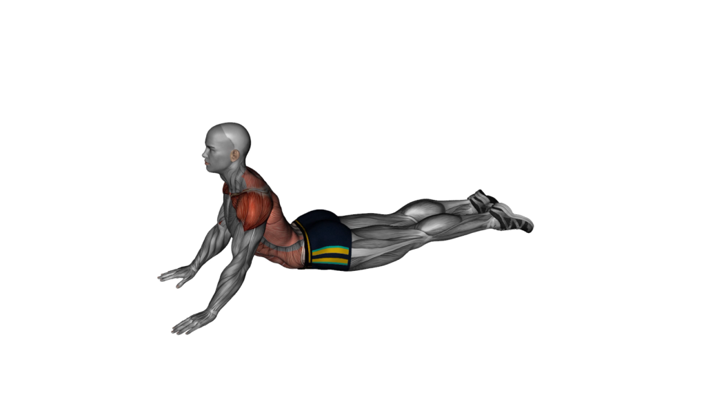 A beginner performing the Lying Prone Abdomen Stretch, demonstrating proper technique and form.